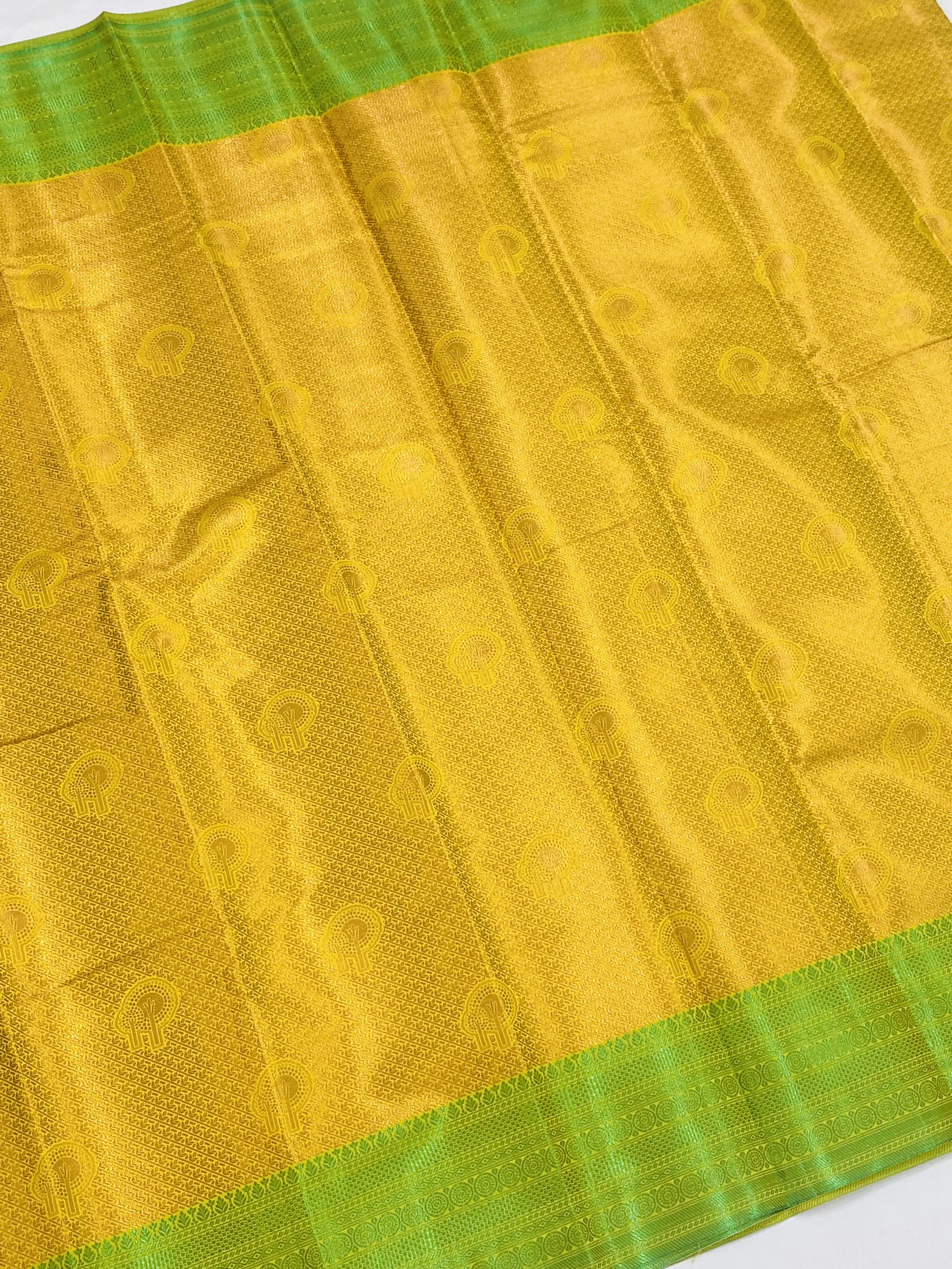 Appealing Yellow Color Brocade Jaquard Art Silk Saree With Green Contrast Border