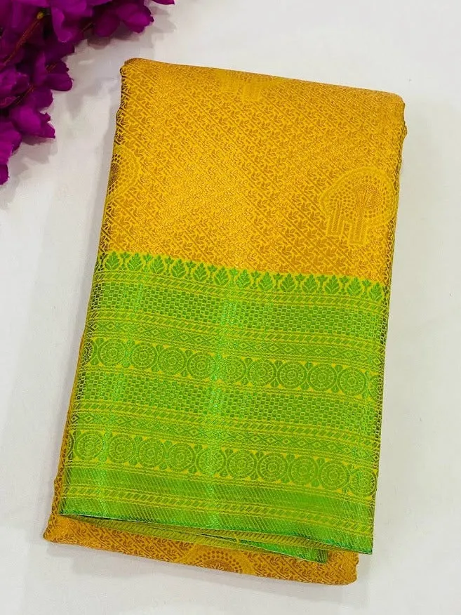 Appealing Yellow Color Brocade Jaquard Art Silk Saree With Green Contrast Border