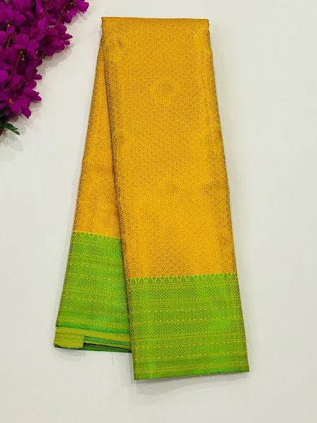 Appealing Yellow Color Brocade Jaquard Art Silk Saree With Green Contrast Border