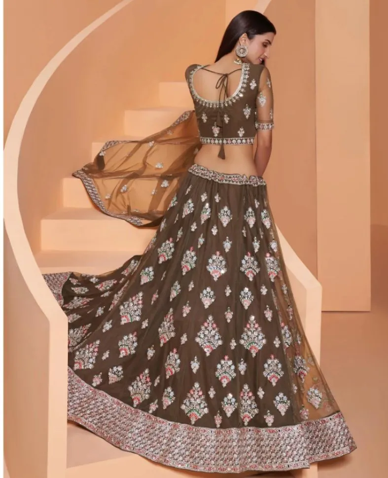 Beautiful Green Colored Partywear Designer Lehenga Choli - Rent