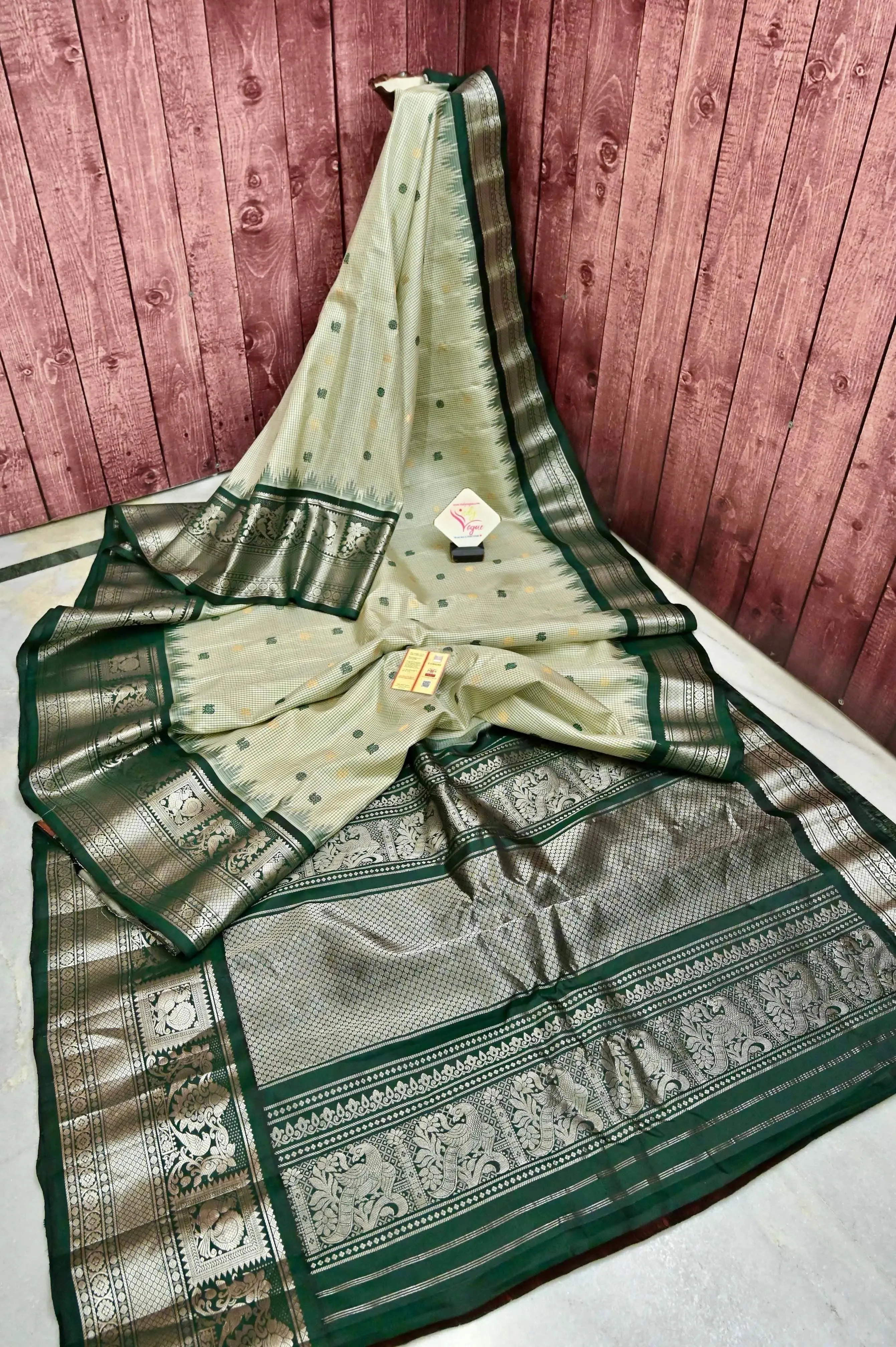 Bottle Green and Offwhite Color Pure Gadwal Saree with Checks and Silver Zari Work