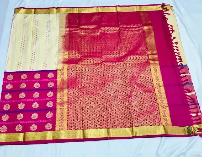 Marvelous Kanchi Silk Saree In Archaic Ivory With Pink Border - SILKMARK CERTIFIED